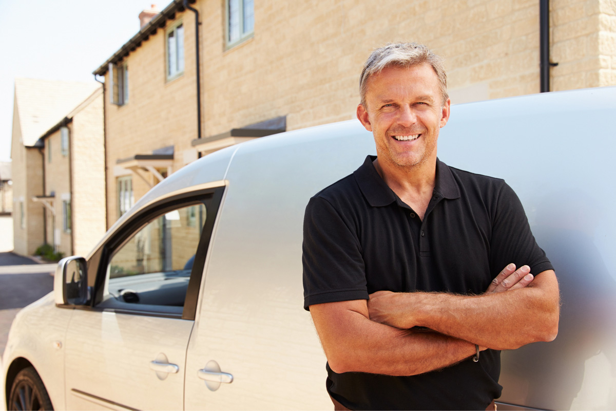 business owner driving company vehicle with Commercial Auto Insurance